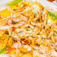 Nachos Fajita · Cooked with bell peppers, onions and tomatoes. Topped cheese dip over crispy fried tortilla ...