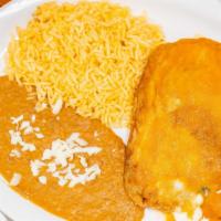 Chiles Rellenos · Two Chile poblano peppers, stuffed with cheese, lightly battered, and deep fried. Served wit...