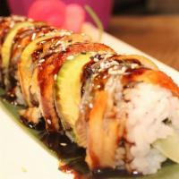 Sweet Dragon · California roll wrapped with eel, avocado and eel sauce.