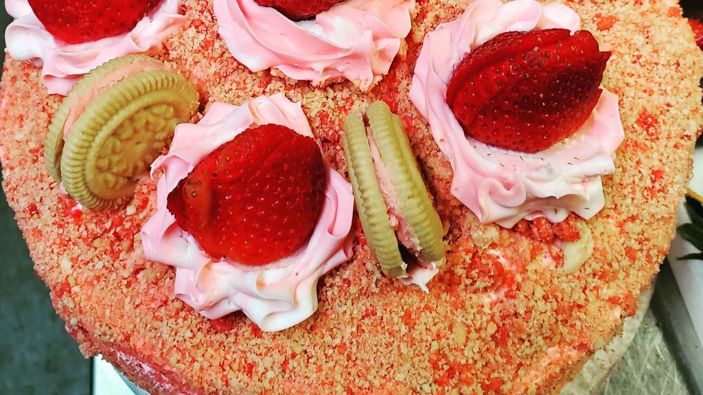 Strawberry Crumble Cake · Strawberry cake with a Cream & Strawberry Filling Topped with Homemade Friendly Strawberry Crumbles