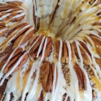 Pecan Praline Cake · Delicious Pecan Cake with Cream Frosting and Topped with Pecan Toppings