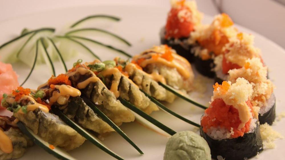 Volcano Roll · Fried. Salmon, tuna, yellowtail, and crab lightly fried and topped with spicy mayo and eel sauce.