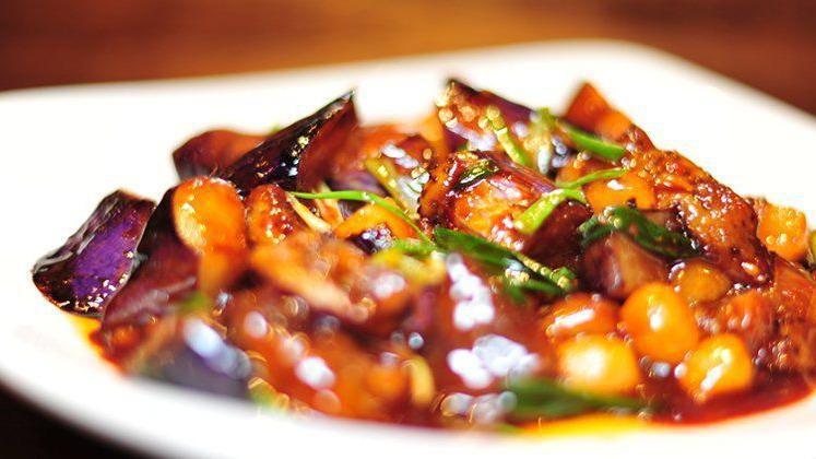 Sautéed Eggplant, Bell Peppers & Potatoes · Vegetarian. Containing no animal meat. Stir-fried potato slices, eggplant, and green bell peppers in dark soy sauce.