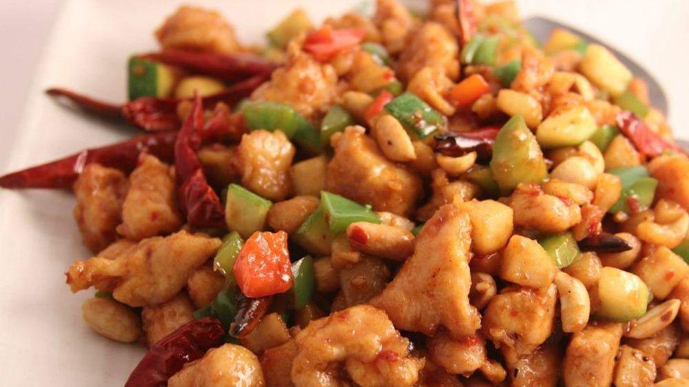 Thai Style Crispy Cashew Chicken · Spicy. Spicy: sharp, fiery taste. Mild spicy. Crispy chicken, mango, and bell peppers in a sweet lemon sauce. Served with cashew nuts.