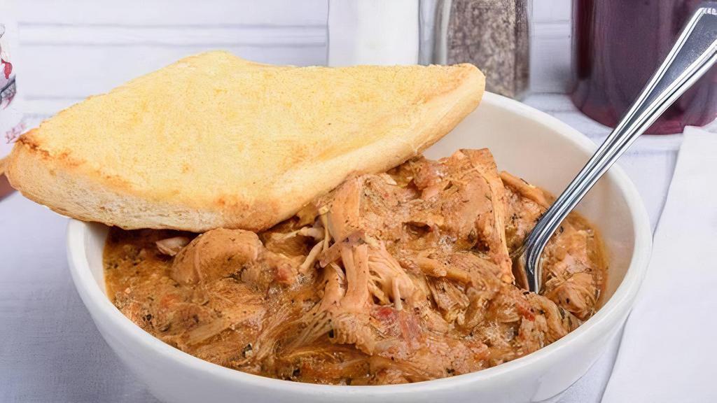 Drunken Chicken · Tender chicken slow cooked with garlic, stewed tomatoes, Cajun spices, and beer. Served over steamed rice with Texas toast.