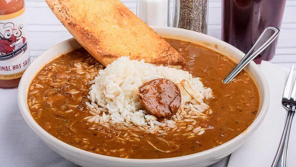 Smoked Sausage Gumbo · Deep brown roux, onions, and celery slow cooked for over four hours and served with smoked sausage. Served over steamed rice with Texas toast.