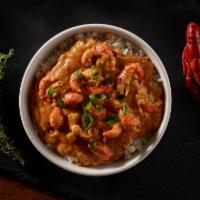 Crawfish Etouffee · Tender crawfish smothered in our golden roux, with celery, onions, and pepper. Served over s...