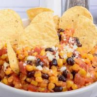 Bumblebee Stew · A blend of yellow corn, stewed tomatoes, onions, and black beans in sweet and spicy cream sa...