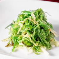 Seaweed Salad · Fresh seaweed salad. Served over a bed of julienned cucumbers and tossed with a Japanese vin...