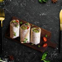 Chicken Egg Kathi Roll · Chunks of boiled chicken with egg and cream sauce wrapped in Indian style paratha.