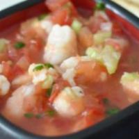Guatemalan Ceviche · Gulf shrimp, scallops, fish, avocado, tomatoes, onions, cilantro, and peppers marinated in a...