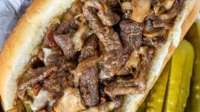 Philly Cheesesteak · Tender bites of sirloin, sautéed, peppers, mushrooms, onions, and melted provolone.