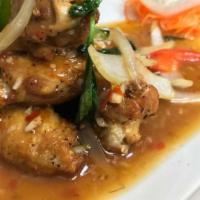 Thai Chicken Wings · Wok-seared chicken, water chestnut, and mushroom. Alongside with lettuce, crispy noodles, an...