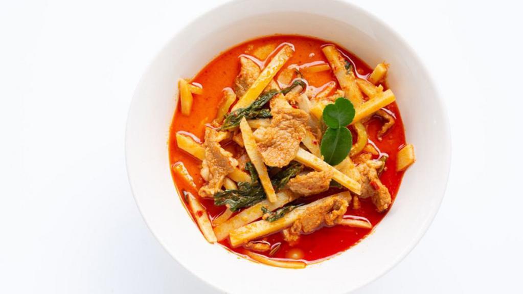 Red Curry · Mild. An aromatic blend of coconut milk, bamboo shoots, zucchinis, bell peppers & Thai basil leaves.