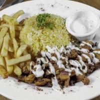 Chicken Shawarma Plate · SEASONED CHICKEN WITH GRILLED VEGETABLES SERVED GARLIC OR TAHINI  SAUCE .