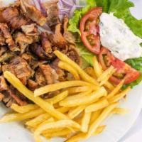 Gyro Plate · HAND CARVED ROAST OF BEEF AND LAMB MIXED.  SERVED WITH TZATZIKI SAUCE .