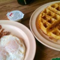 Belgian Waffle Platter A Large · Belgian waffle served with 2 eggs any style, bacon or sausage.