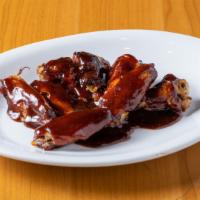 Chicken Wings · Choice of BBQ, mild buffalo, spicy buffalo, jerk, honey BBQ, korean BBQ or mango habanero st...