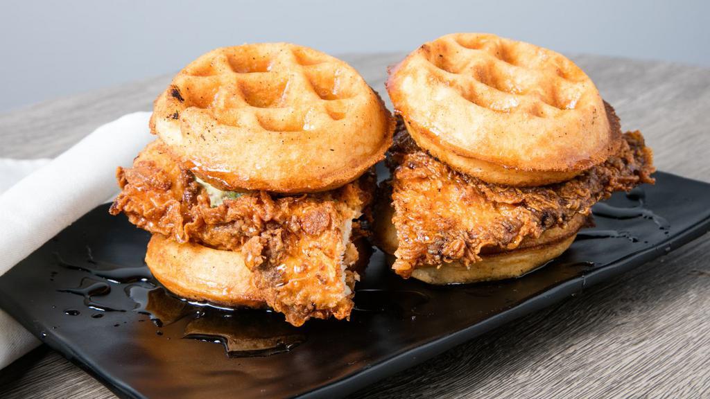 Asian Chicken Waffle Sliders · Spicy. Tender fried chicken, tiny sweet waffles, ghost pepper butter and orange honey sauce.