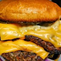 Awesome Burger · Two all american grilled beef patties topped with two pieces of american cheese, mayo, fresh...
