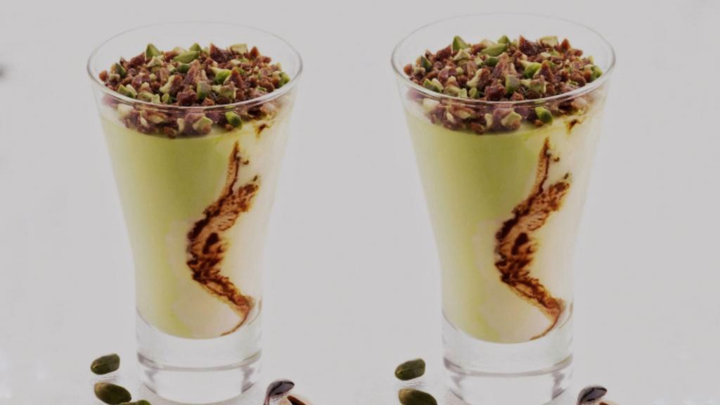 Coppa Pistachio · Custard Gelato Swirled together with chocolate and pistachio gelato, topped with praline pistachios