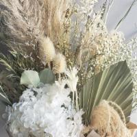 Dried Wrapped Bouquet · Dried fan palms, baby's breath, and other specimens. Wrapped and ready for your vase.