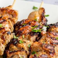 Chicken Kebabs  · Chicken Kebabs with choice of white rice, rice and beans, or a side.