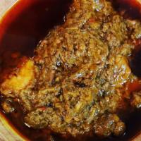 Okra Soup With Lamb  · Okra soup with fish or lamb and a side of rice or fufu.