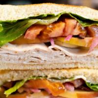Settlers · Turkey, bacon, sliced apple, pickled onion, Swiss, tomato, lettuce, with mayo.