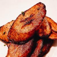 Fried Plantains · Deep-fried sweet plantains with gastrique.