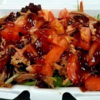 Bbq Salad · BBQ Pork, Turkey or Chicken Strips Salad, served over Mixed Greens, with Cheese, Tomatoes an...
