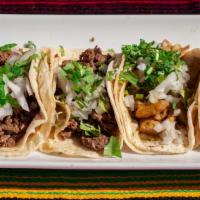 Tacos  · Tacos with your choice of stew
Tacos con tu guisado favorito

Choose handmade tortillas or r...