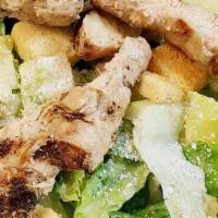 Chicken Caesar Salad · A juicy grilled chicken breast atop a classic Caesar with grated Romano cheese and croutons ...