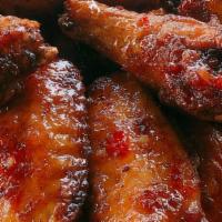 Wings 10 Ct · 10 wings.  Served with a choice of ranch or blue cheese dressing and carrot sticks.