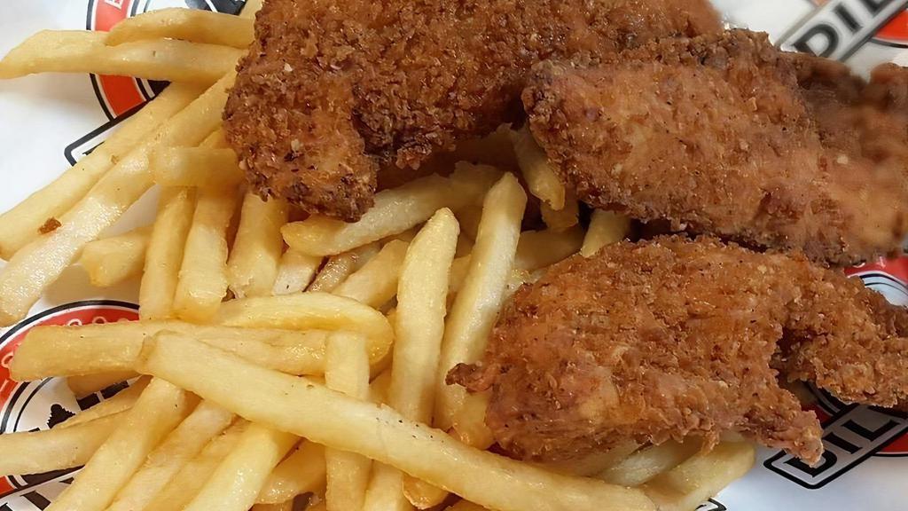 Chicken Tenders · Our popular freshly breaded chicken strips fried until golden brown and served over seasoned French fries with a side of honey mustard.