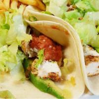 Blackened Chicken · Two soft tacos stuffed with blackened chicken, spicy salsa, fresh avocado, and chopped lettu...