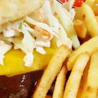 The Carolina · Hand-pattied burger brushed with sweet BBQ sauce then topped with melted Cheddar cheese and ...