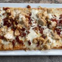 Chicken Bacon Ranch · Flatbread drizzled with olive oil, sprinkled with seasoning. Loaded with chopped bacon and c...
