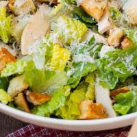 Chicken Caesar Salad · Romaine lettuce, thinly sliced grilled chicken, homemade croutons, caesar dressing and shred...