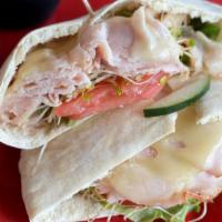 Turkey Tzatziki Pita · Turkey, swiss cheese, cucumbers, sprouts, lettuce, and tomato. Your choice of dressing or tr...