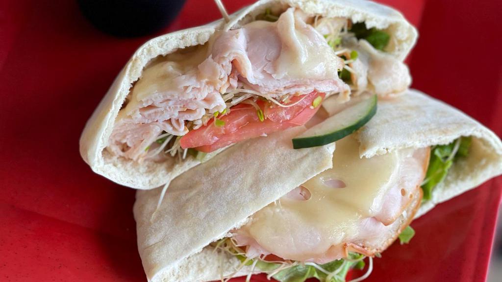 Turkey Tzatziki Pita · Turkey, swiss cheese, cucumbers, sprouts, lettuce, and tomato. Your choice of dressing or try our new tzatziki sauce.