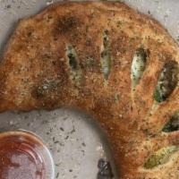 Calzone (Regular) · Ricotta cheese, mozzarella and any two toppings.