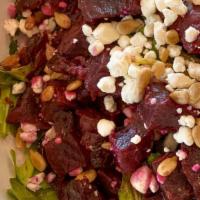 Roasted Beet Salad · Arugula, Sunflower Seeds, Dried Cranberries, Goat Cheese, & Lemon Thyme Vinaigrette