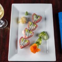 Sweet Heart Roll · Shrimp, avocado, crunchy in side tuna on the top.