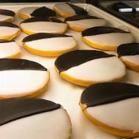 Black & White Cookie · Half-moon cookies are slightly dome-shaped, have frosting on a fluffy angel cake base.