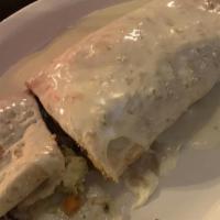 Burrito California · Popular. One jumbo tortilla filled with rice, beans, sour cream, guacamole, lettuce, pico de...