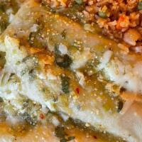 Enchiladas Verdes · Three enchiladas, one cheese, one chicken, and one beef. Topped with cheese and green sauce....