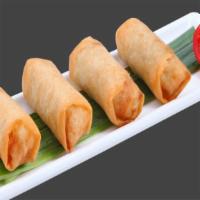 Spring Rolls · Homemade crispy fried vegetarian rolls served with sweet and sour sauce.
