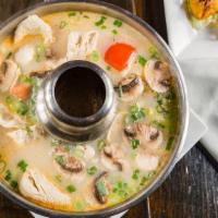 Tom Kha · Tom kha is a widely-recognized Thai broth with mushrooms, tomatoes, green onions, and cilant...