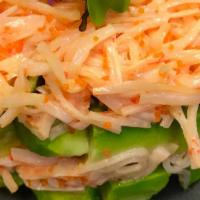 Spicy Crab Avocado Salad · Contain raw food. Mixed crab and masago with spicy sauce atop a half cut avocado and seaweed...